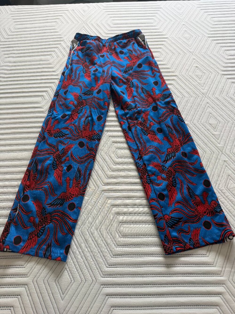Kenzo blue and red pants with a white stripe and the brand name on the side, siz